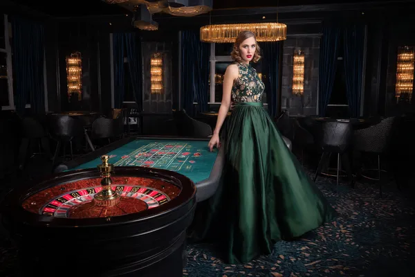 A player using their smartphone during a festive local event, representing JILIX’s fully mobile-friendly casino.